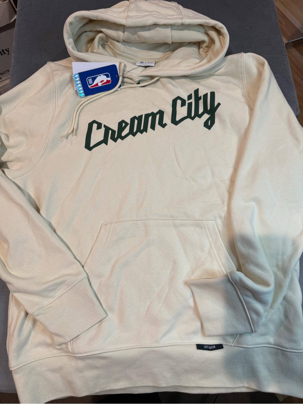 Nike Cream Pullover Hoodie with Dark Green Chest Script